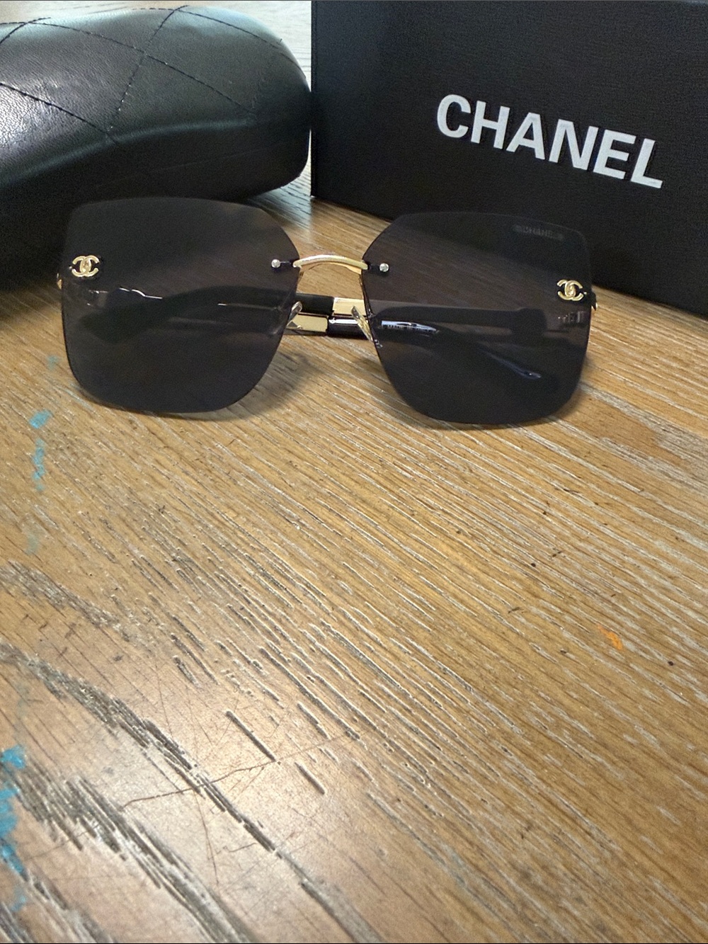 CHANEL Rimless Square Sunglasses in Black and Gold Accents - Picture 4 of 10